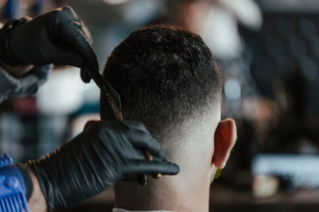 barber-adds-final-touches-to-a-haircut